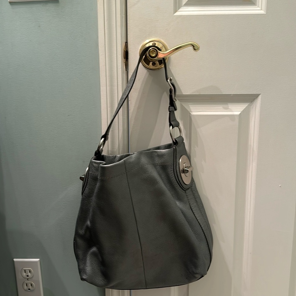 Stylish silver Coach purse